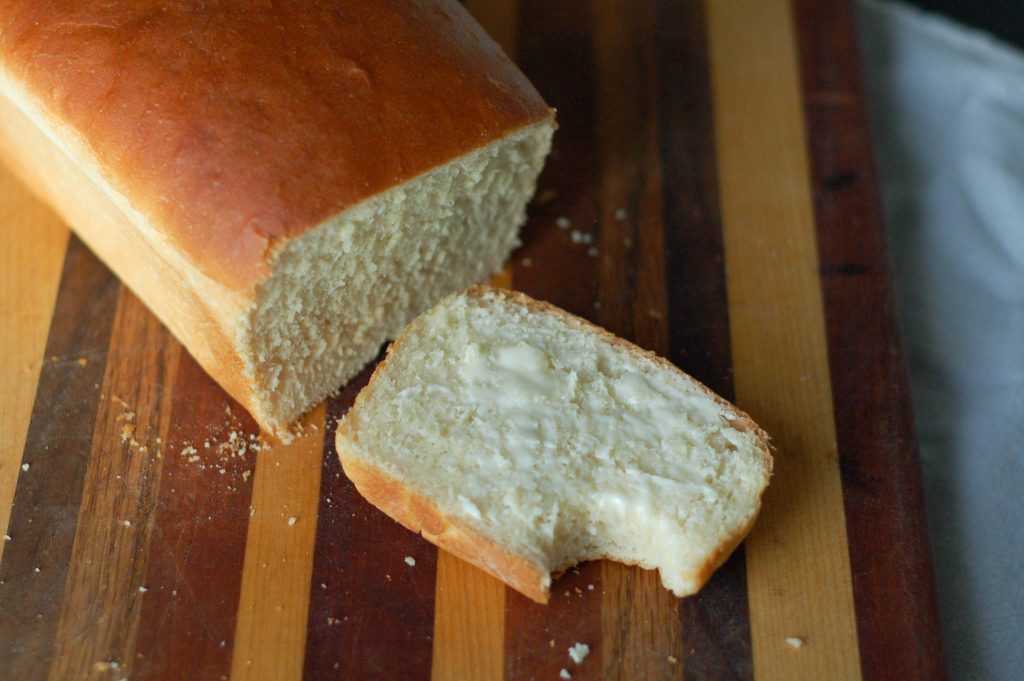 sliced fresh bread with a bite