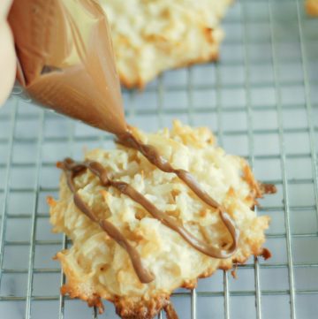 coconut macaroon on cooling rack with chocolate stripes