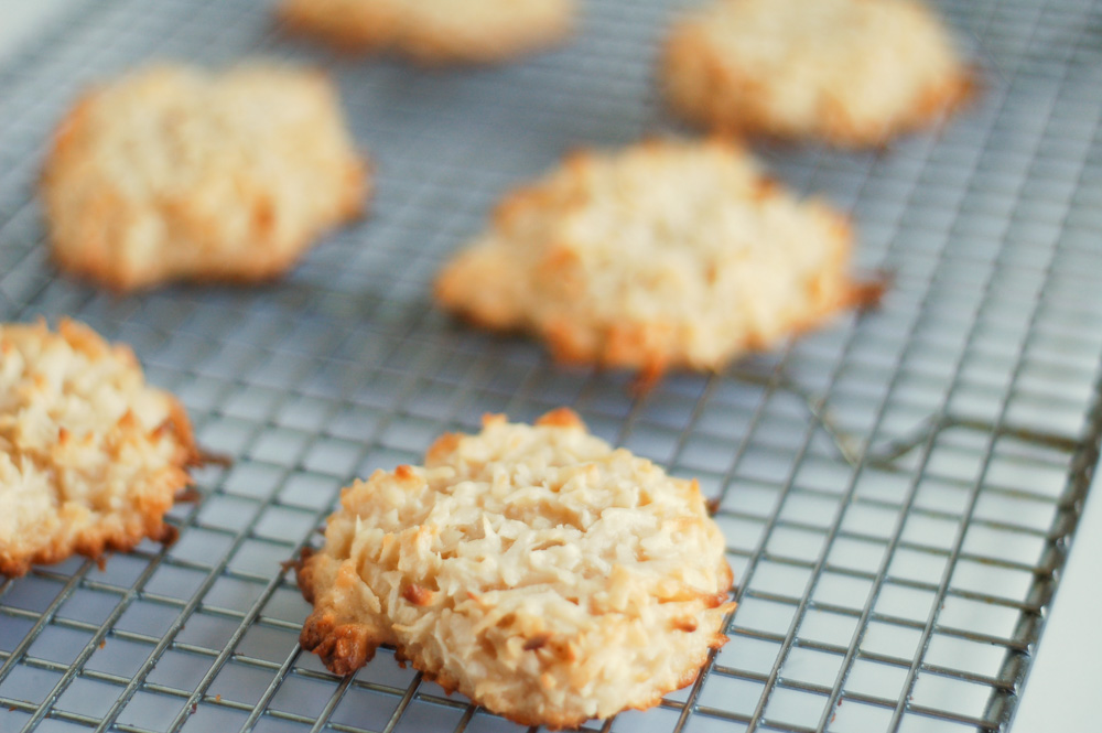 baked coconut macaroon cookies on a cooling rack on