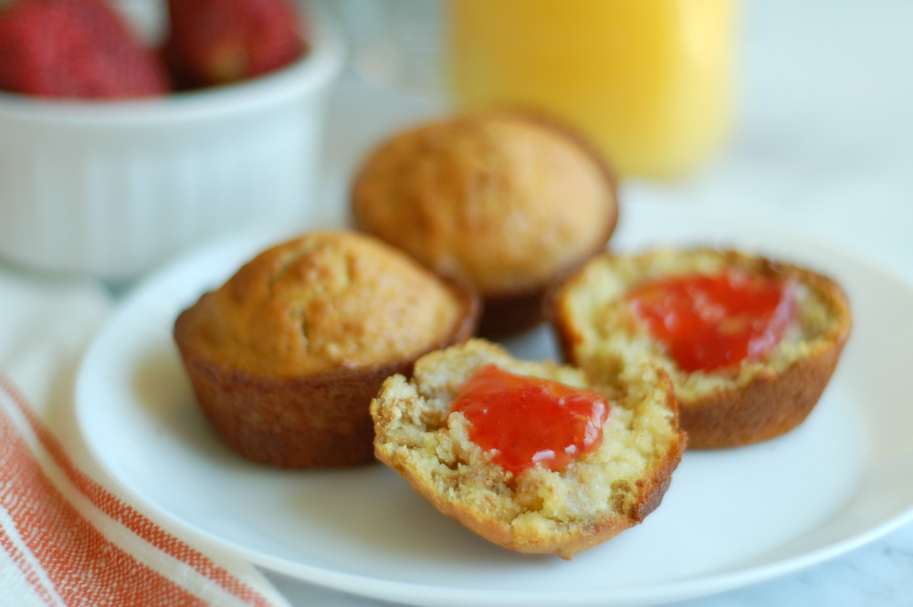 fresh baked bran muffins with butter and strawberry jam