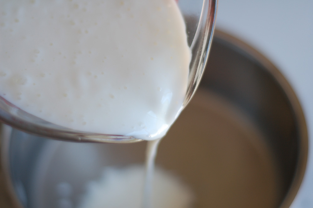 pouring buttermilk into a pan