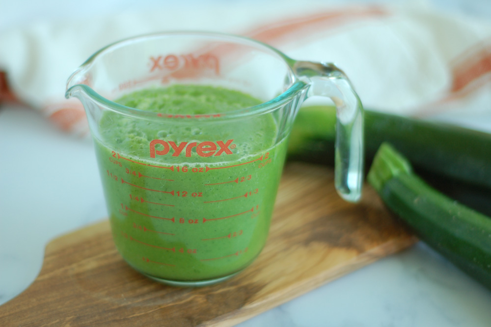 2 cup glass measuring cup with pureed zucchini 
